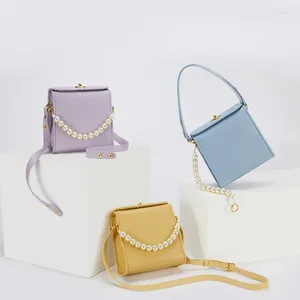 Axelväskor 2024 äkta läderväska för kvinnor lady girl mode enkel liten fyrkantig crossbody box pearl handväska