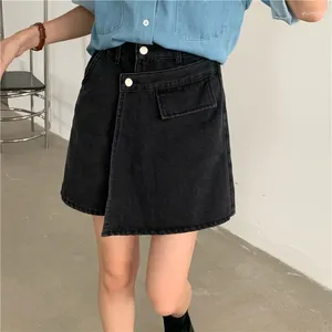 Röcke Frauen modische Jeans solide hohe Taillenknöpfe Taschen Asymmetrische A-Line-Wickelrock Frühling Herbst 2024