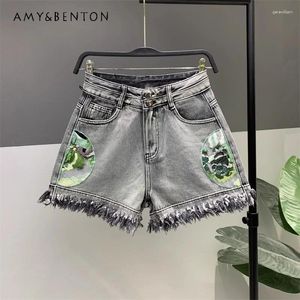 Kvinnors shorts sommar 2024 kinesisk stil broderi brett ben denim all-match lös bantning a-line blixtlås tassel byte byxor