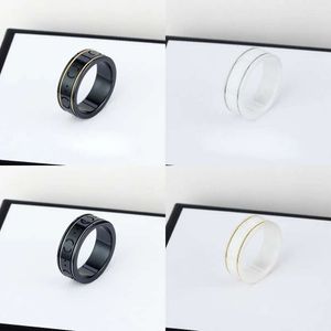 Keramik guld för kvinnor män designer ring mens ringar band g brev svarta vita par smycken jubileumsgåva s i ift