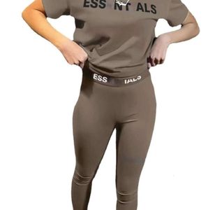 Дизайнерские женские спортивные костюмы Silm Bants Комплект двух частей для беггера набор 2024 Новые буквы с короткими рукавами.