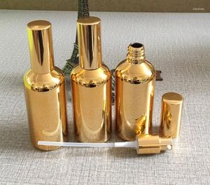 Garrafas de armazenamento no atacado 100 ml de alta temperatura Garrafa de loção em ouro com embalagem cosmética da bomba para creme líquido