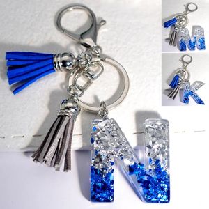 Keychains Glacier Sea 26 Initialen Harzschlüsselkette A bis Z Pailla Füllschlüssel für Frauen Männer blau grauer Quasten -Anhänger Handtasche Zubehör Accessoires