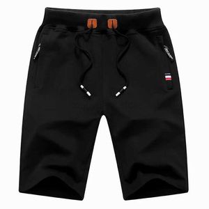 Mäns shorts 2023 Sommar Nya herrens casual sportshorts Trend Mens Solid Cotton Running Sports Shorts Drawstring High Quality Bermuda Shorts 240419 240419