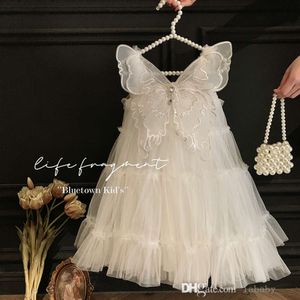 Abiti da bambina Abito da principessa Summer 2024 Nuova farfalla Abito alato alato Abiti da sposa bianca Gonne per feste di compleanno dolci