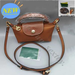 Bolsa de alta folga de couro de couro de couro conhaque qualidade pequena bolsa de fontes de carga pequena bolsas de mão única carteira feminina mini bolsas de designer de bolinho de massa brancas wxra