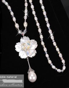 Naszyjnik perłowy łańcuch swetrów długi kwiat Pearl Pendant Women039S Moda wisiorek 4961268