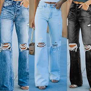 Ladies jeans 2024 summer new high waist temperament washed hole casual denim trousers.