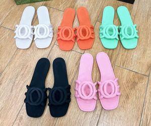 Sommer Neue Frauen flache Slipper Mode Gelee Farbe hohle weiche und komfortable Sandalen Innenbad Freizeit Beachschuhe mit Schachtel