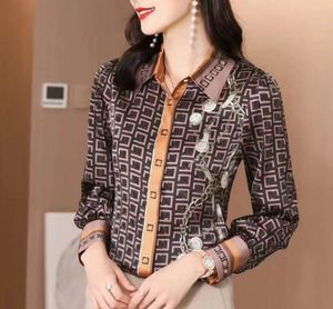 女性用シルクブラウス2024クラシック格子縞のラペルシャツ春秋ルース薄い薄い気質トップファッション幾何学シャツブラウス