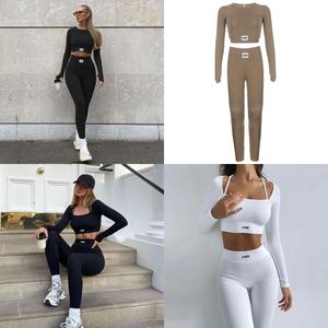 Två kvinnors styckbyxor sätter kvinnor sportkläder träningskläder för sportuppsättningar kostymer fiess långärmad yoga leggings s