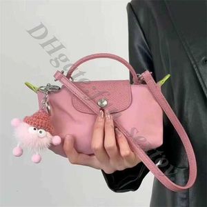 違い卸売ボルサオリジナル穴あきピンクバッグsac de jour色のトイレタリーバッグストラップパンミニ軽dump子のバージョン小さな選択肩Vcz3