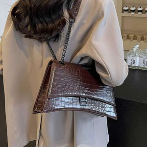 Bolsas de designer de bolsas azuis Bolsas Tote Hong Kong Agente de compras Padrão de crocodilo genuíno Saco pequeno para feminino novo ombro único Cadeia retrô coreana