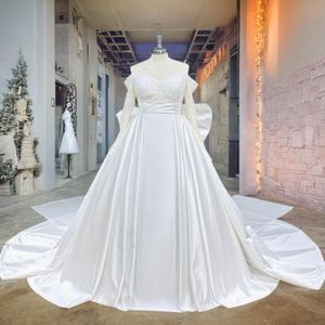 Hire Lnyer Off The Shoulder Long Sleeve Sweetheart Neck Zipper Up Back Beads Sequins Satin Ball Gown Wedding Dresses With Detachable Long Bow