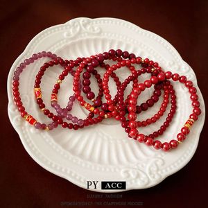 geomancy tillbehör ny kinesisk stil lycklig koi vermilion pärla elastisk armband, litet minimalistiskt, fashionabla och mångsidiga handkläder för kvinnor