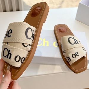 2024 Luxury Sandals Woody Mule Flat Slides Designer Canvas Slippers Womens Letter sandal slipper shoes casual thick bottom net red summer flat flip flops women ooo22