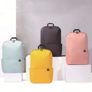 Ryggsäckar original xiaomi ryggsäck 15l student skolväska ljus färgglada par mi ryggsäck resor 14 tum bärbar dator ryggsäck dropshipping