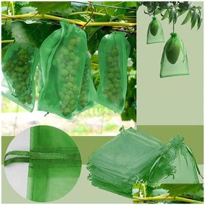 Sonstige Gartenlieferungen 100pcs Obstschutzbeutel Trauben Mesh Bag Agrictural Orchard Anti-Bird Netting ER Gemüse Stbert wachsen dr.2ha