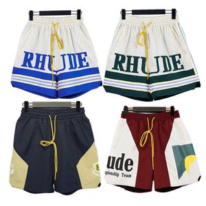 Rhude 23 Spring and Summer New Mens Letter Splice Embroidered Ribbon Casual Loose Five-point Shorts