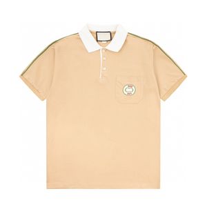 Polo skjorta designer polos skjortor för man mode fokus broderi orm strumpor små bin tryck mönster klädkläder tee svart och vita män t shirtq33