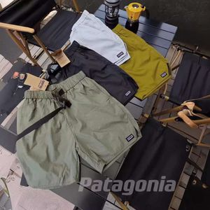 Short di marca alla moda e pantaloncini sottili per gli sport maschili e pantaloni casual sciolti di grandi dimensioni 5/4 estate