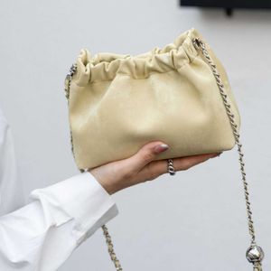 Liten Cowhide och Versatile Womens Bag Single Shoulder Crossbody Golden Ball Chinese Style Simple Fashionable dragkedja Dumpling