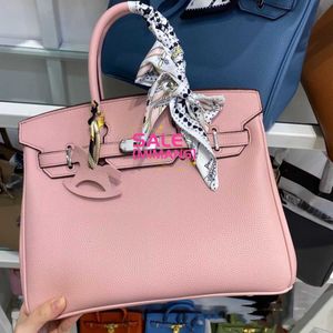 A Birknns Designer bag and fashionable Elegant versatile lychee patterned cowhide leather for womens handheld crossbody single shoulder silver buckle classic OCS