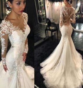 2021 Gorgeous Lace Mermaid Wedding Dresses Sheer Neck Dubai African Arabic Style Long Sleeves Fishtail Bridal Gown Plus Size Illus3147926