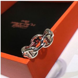 Anelli di banda di luxurys designer di marca di alta qualità 925 sterling in argento rosa naso rotondo circolare anello cavo per uomo regalo di gioielli con scatola bella ww