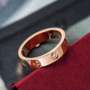 Дизайнерская мода Advanced Carter Тот же кросс -циркон титановый сталь сталь и женские кольца Элегантное темперамент золотой кольцо украшения