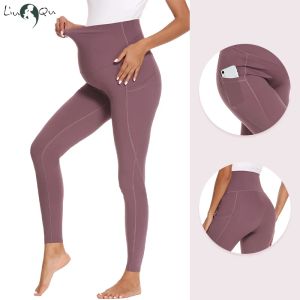 Capris Nya kvinnors moderskap Yoga Pants Graviditet Mama kläder för kvinnor med fickor Hög midja träningsbyxor för kvinnors leggings