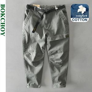 Primavera de outono de primavera Men Algodão de cor sólida calça de carga solta masculina roupas grandes bolsos jogadores homens streetwear Az331 240412