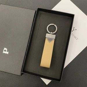 High Quality Designer Keychains for Men and Women, Luxury Fashionable Triangle Logo Keychains, Zinc Alloy Car Keychains, Couple Gift Keychains, 8-color Ribbon Box