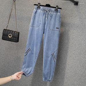 Jeans femininos de tamanho elástico de tamanho elástico de retalhos de retalhos femininos com calças de cargo de jeans de jea