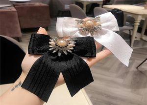 Personality Crystal Bow Conts Pins Fashion Wedding Party Brooches для женщин Высококачественные тканивые булавки для Ladies6481967