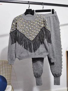 レディースツーピースパンツゴールデンスタービーズアップリケウォームニットスーツ女性刺繍タッセルフラワーセーターパンツピースセットWY1785