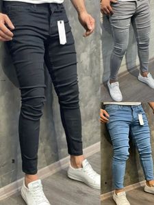 Высококачественные эластичные джинсы для эластичных скинни мужчины европейские американские классические сплошные джинсовые брюки. Случайные панталоны Hombre Joggers 240420