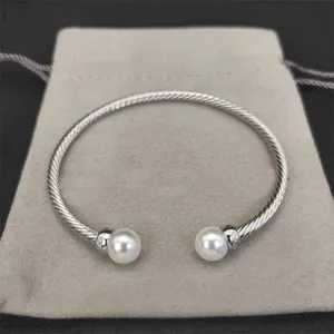 Klasyczny DY Bransoletka projektant Modne Srebrne złote bransoletki pokręcone bransoletki dla kobiet Diamond Pearl Head Bracelets Mężczyzn