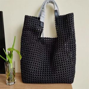 The new hand-woven Tote bag niche design casual one shoulder portable large capacity commuter underarm bag temperament elegant worthy of 28*24