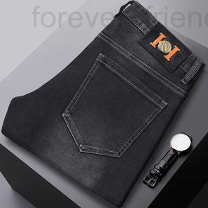 Mäns jeansdesigner 2023 Autumn/Winter Thick European High End Quality Elastic Slim Fit små raka svarta avslappnade byxor VD84