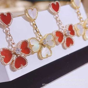 Designer charm hög version van fyra bladgräsörhängen för kvinnors nya hjärtformade kärlek 18k rosguldtassel