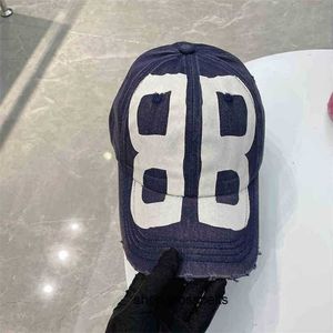 24 family Balenclaga b caps Sport cap Hat female Paris home same spray painting graffiti duck tongue cap letter baseball cap old grinding edge washing couple