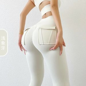 Frachtwind -Fitnesshosen Frauen mit Taschensport -Leggings hohe Taille Pfirsich Hip Yoga Hosen Lange Hosen zum Abnutzen 240420