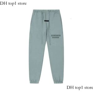 Homens Essentialspants lã as calças de moletom de linhas duplas calças de cordão de líder calça lateral de calça lateral de costura luminosa