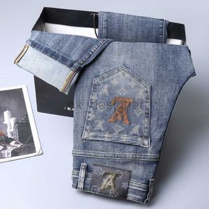 Męski projektant dżinsów jesień i zima nowe dżinsy jakość Slim Fit Małe stóp długie spodnie moda lwh ht762f
