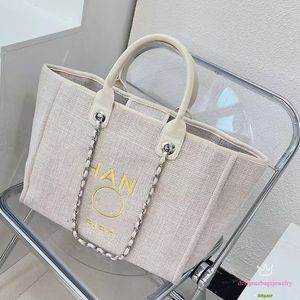 Lyxdesigner handväskor kvinnlig klassisk strandväska shoppingväska stor kapacitet duk axelväskor för kvinnor nytt mode 2023