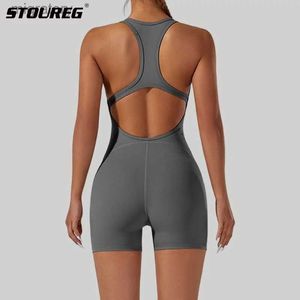 Women's Tracksuits Stoureg womens one-piece yoga drum set tight fitting hip lifting sexy open back breathable shorts sports and training clothes yq240422