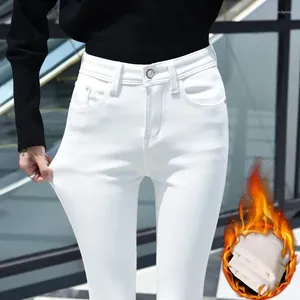 Kvinnors jeans vita tillägg sammet förtjockar kvinnor höst vinter koreansk version av snäva pennbyxor hög midja hålla varma svarta fötter
