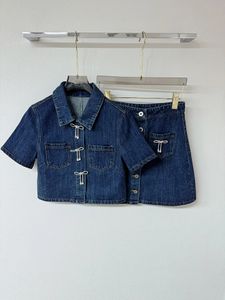 2024 Springsummer Retro Denim Bright Diamond Bow Embelling Short Topa-linje Hög midja Kjol Kvinna Tvådel Set 240419