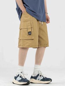 Męskie spodnie multi kieszeni szorty robocze dla mężczyzn Summer American Retro modna marka 5 -calowe luźne luźne 5 -calowe spodnie Y240422
